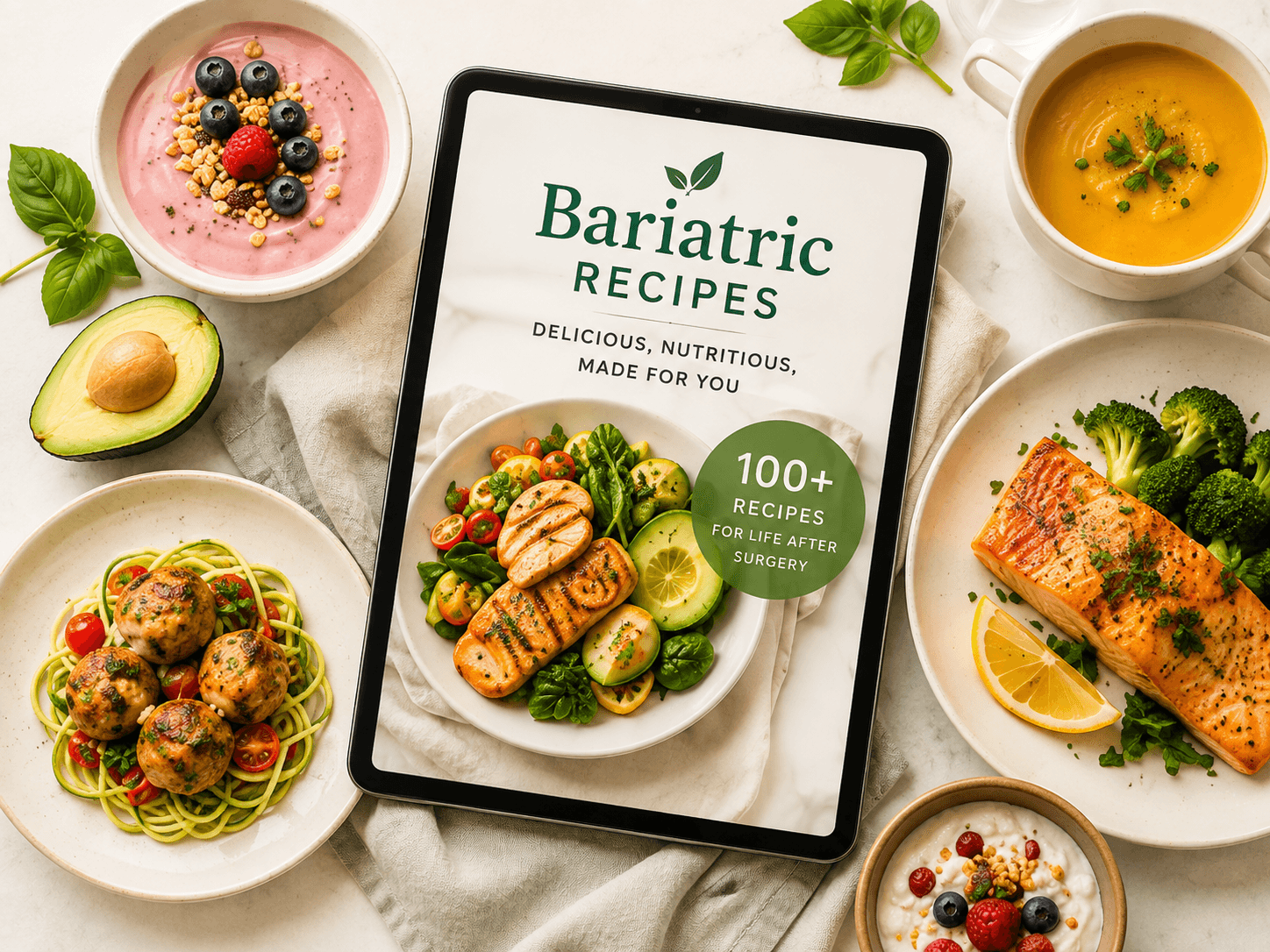 Bariatric Recipes digital cookbook surrounded by prepared dishes