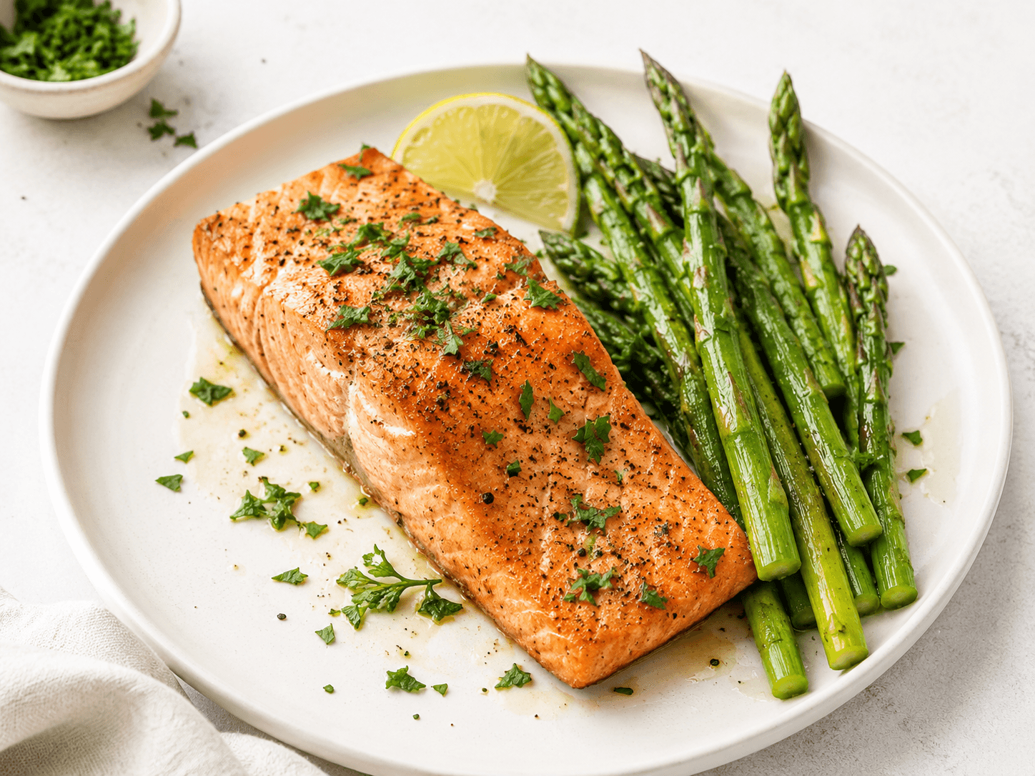 Garlic lemon salmon served with roasted asparagus
